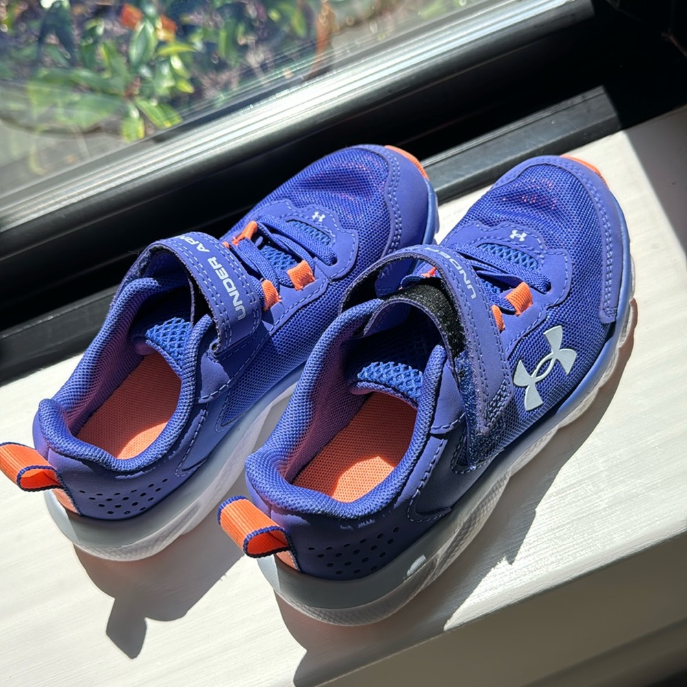 Never been worn 12.5 kids sneakers.